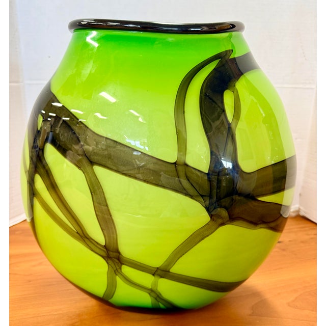A dramatic hand‑blown vessel by accomplished glass artist Chip Scarborough, known for his bold, postmodern aesthetic and...