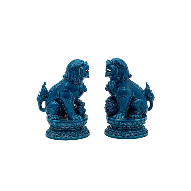 These ceramic Foo Dogs feel surprisingly heavy and cool when you pick them up. The cobalt blue glaze is super smooth...