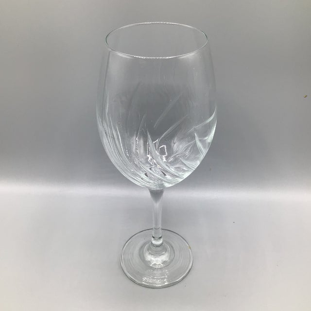 Large wonderful crystal wine glass by Global Amici with sweeping swirl left vertical lines on the inside of the bowl. It...