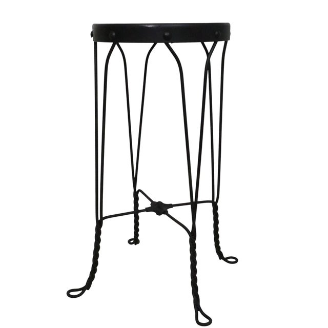 Vintage counter height Ice Cream style stool, in very good, clean and ready to use condition. The stool features a wrought...