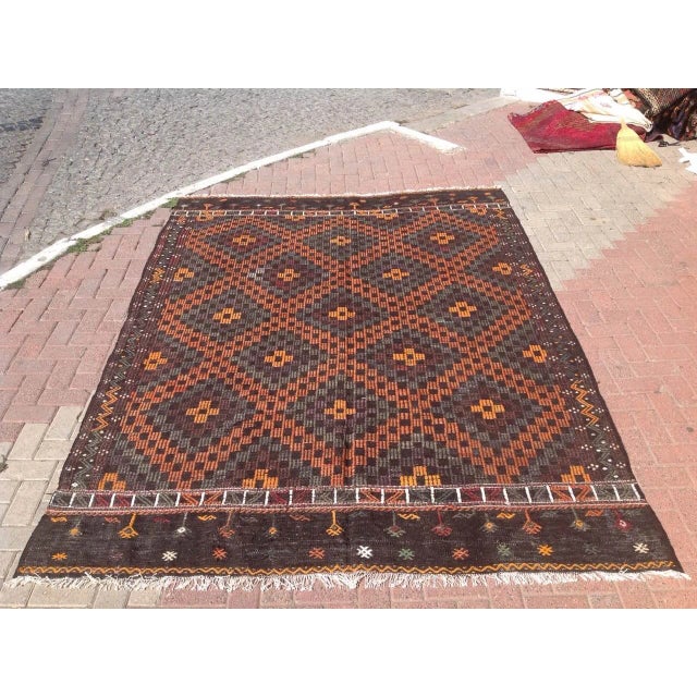 This beautiful, vintage, handwoven kilim is approximately 60 years old. It is handmade, of very fine quality wool in all...