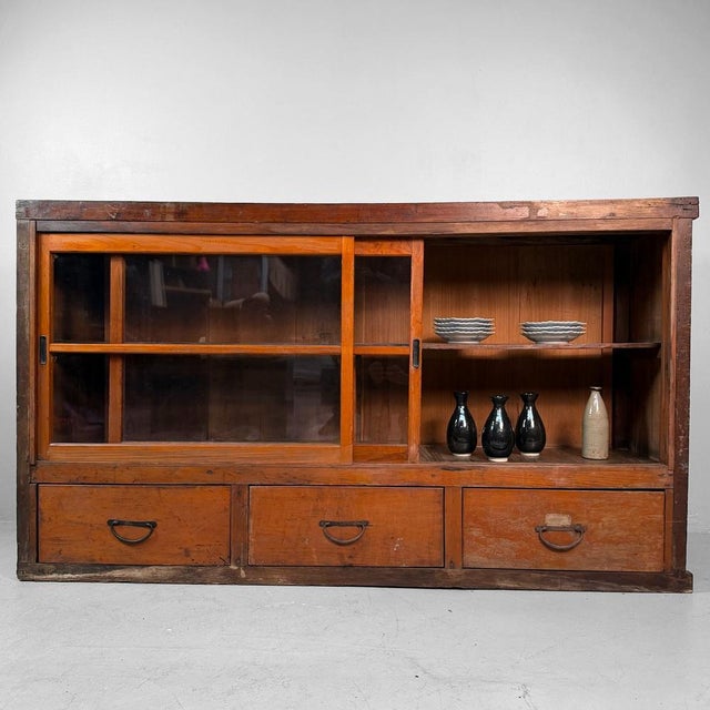 Dimensions: height 100 cm, width 176 cm, depth 47 cm. This rare Japanese shop counter combines storage and display in one...