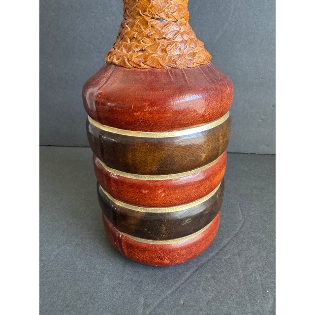 Vintage Italian Leather Wrapped Decanter Mid Century Modern Made In Italy 14" Vintage condition with general wear, scuffs,...