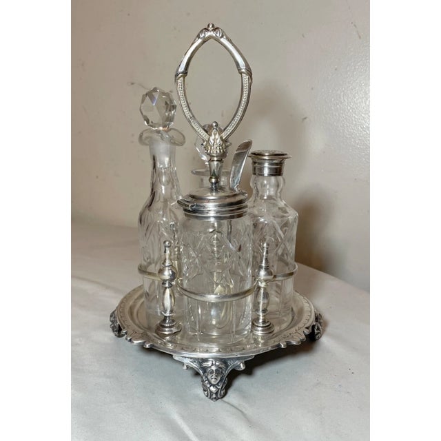 Up for sale is a high quality antique 19th century silver plated figural cruet set. It's a 4 piece set consisting of an...