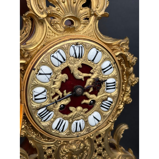 A 19th Century French Ormolu Mounted Tulipwood Clock by Alfred Beurdeley The artist, Alfred Beurdeley, was a cabinet-...