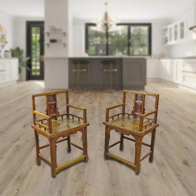 This pair antique walnut armchair was constructed using mortise-and-tenon joinery, with square cutout backs and front. It...