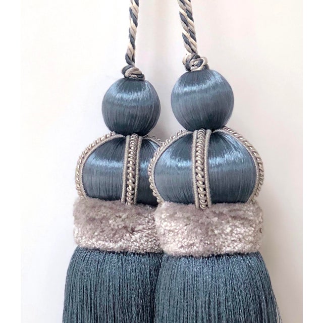 Pair of Smoky Blue tassels with satin & cut velvet details, exclusively available in the US at BespokeLuxe. Quality...