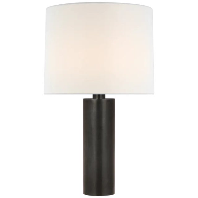 The Silvie Table Lamp by Paloma Contreras offers an elegant lighting solution. The streamlined, elongated base comes in a...