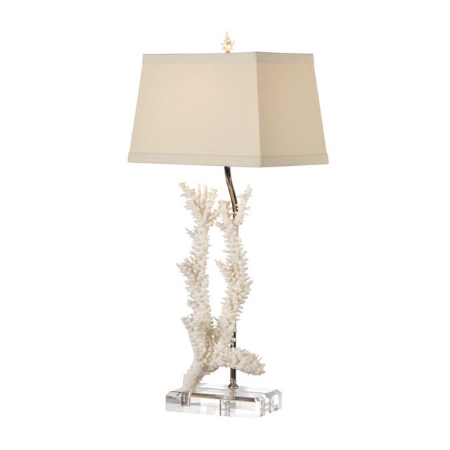 Ideal for any coastal setting, our captiva lamp uses the distinctive texture of the faux coral cast composite to contrast...