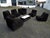 Set of seven separate elements for a seating area with a coffee table. Made of a deep, dark brown plush teddy fabric....