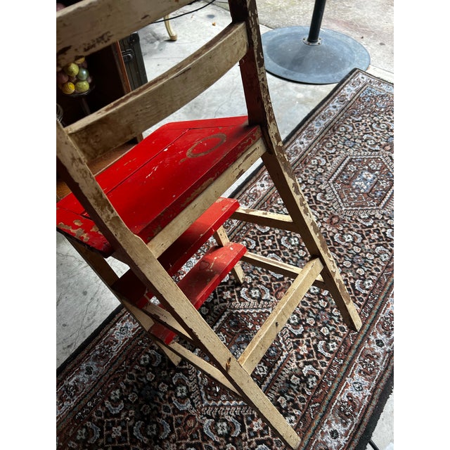 Up for consideration is a beautiful vintage red wooden step stool convertible chair. This would look lovely in your home,...