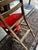 Up for consideration is a beautiful vintage red wooden step stool convertible chair. This would look lovely in your home,...