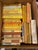 A set of 10 vintage books that range from colors of yellow to orange/red, author, year published that include a variety of...