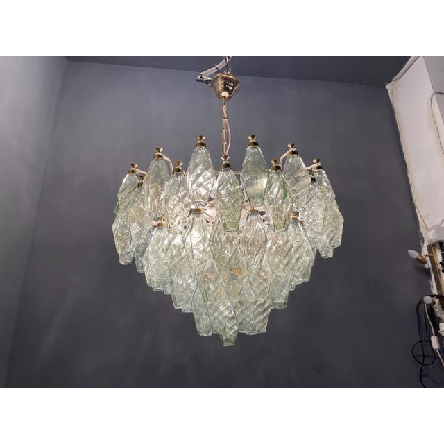 Murano glass polygon chandelier 1980’s light green murano glass polygon shapes. white metal frame completely restored...