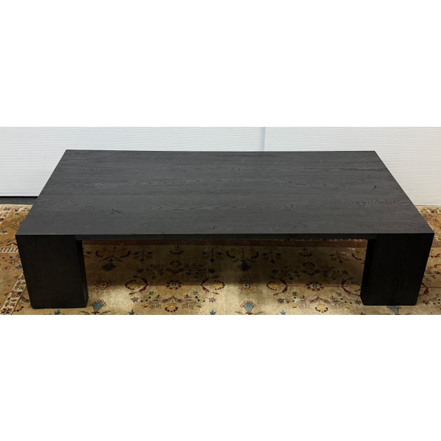 Design Plus Gallery presents a Black Oak Wood Coffee Table from Restoration Hardware. The table showcases the distinctive...