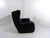 Very comfortable wingback lounge chair. Black leather, chrome wheels.