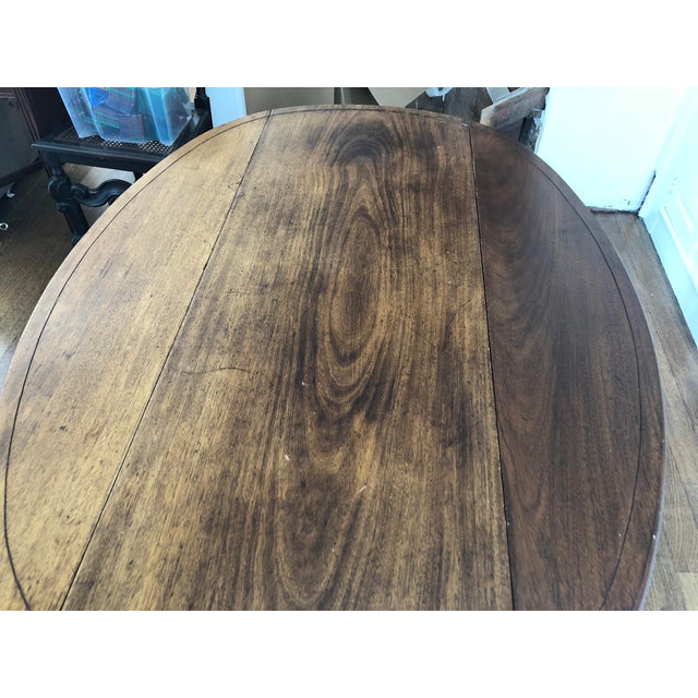 This versatile vintage piece doubles as a sideboard and dining table. It’s perfect for a small apartment or additional...