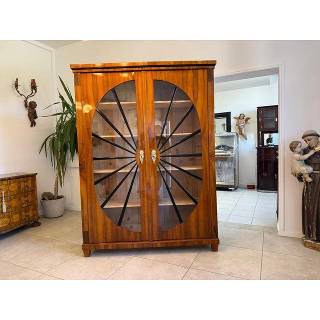 Sun-shaped display cabinet circa 1820 – original biedermeier display cabinet with spectacular radiating mullions | ready...