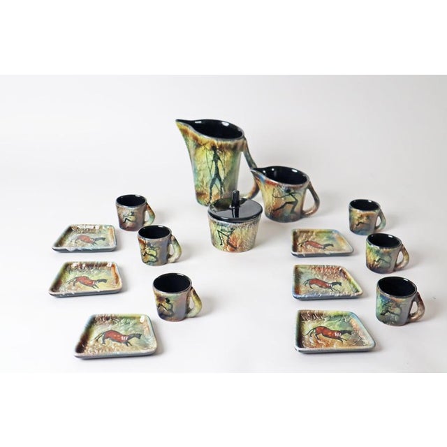 Stunning espresso set for 6 people. The pot is 15cm high and the plates are 10cm wide, 9cm deep and 1.5cm high. This...