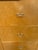 Design Plus Gallery presents a Wardrobing Chest of Seven Drawers. This modern cabinet showcases a light wood veneer with a...