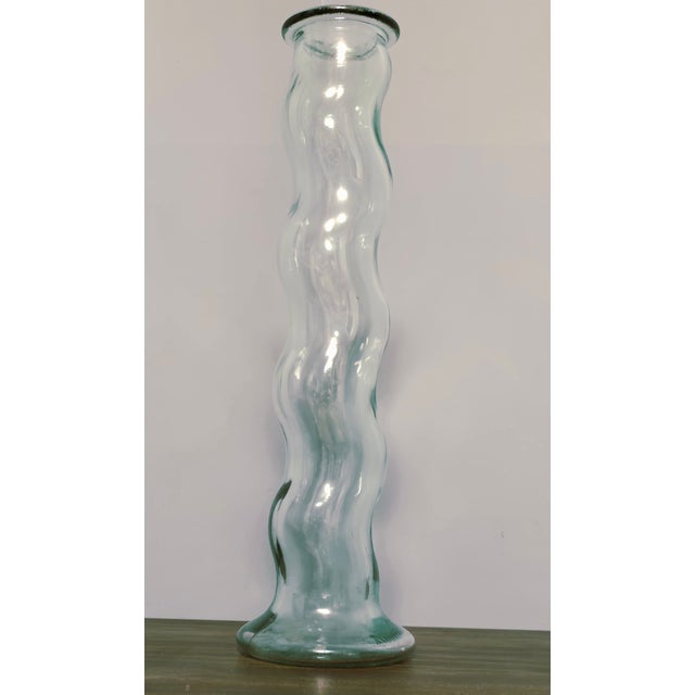 Elevate your space with this striking vintage glass vase, handcrafted in Italy and marked “SVE A” on the base. Its tall,...