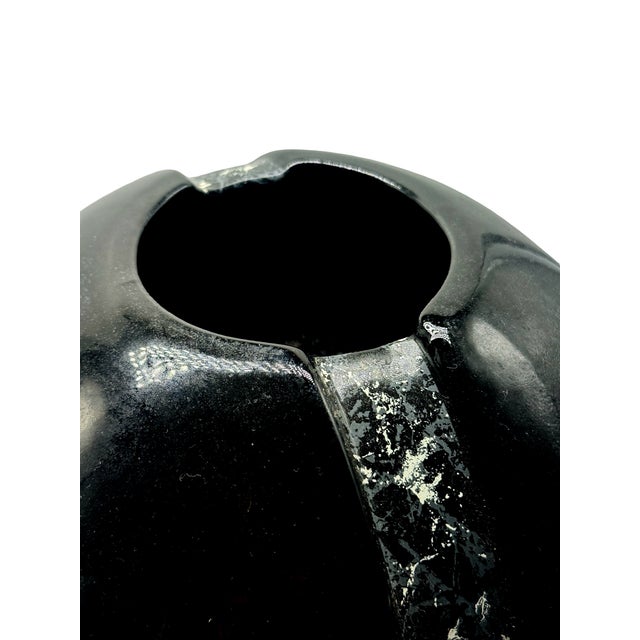 Presenting a striking piece of late 20th-century architectural art pottery: a genuine 1985 Haeger sphere/orb vase (Model...