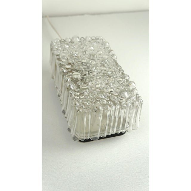 This very nice vintage 1970s ceiling lamp/design wall lamp with bubble glass. This nice vintage ceiling/wall lamp has a...