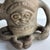 Hand-built Haitian terracotta vessel with anthropomorphic form, featuring sculptural facial detailing and integrated...