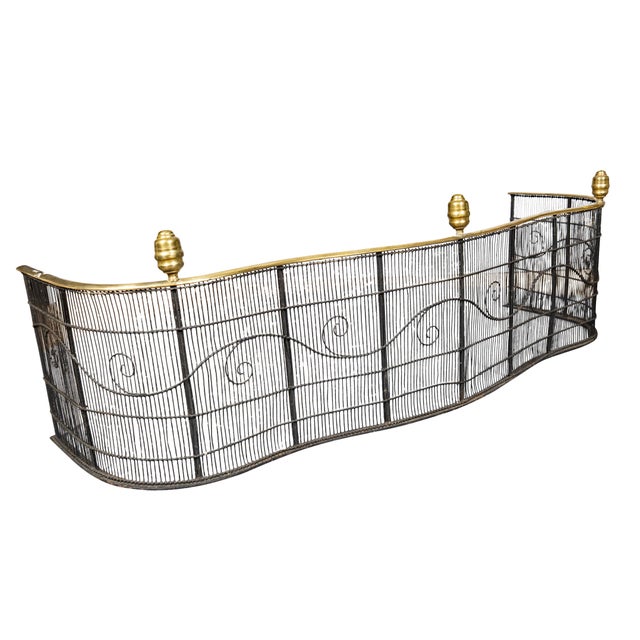 Serpentine shape with beehive brass finials and brass top rail.