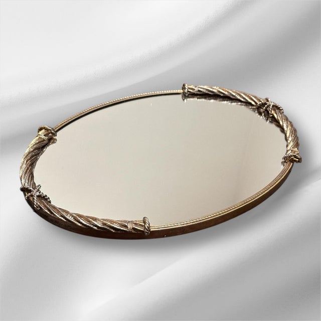 Elevate your dresser or vanity with this stunning vintage Stylebuilt mirrored tray from 1998. This beautiful piece...