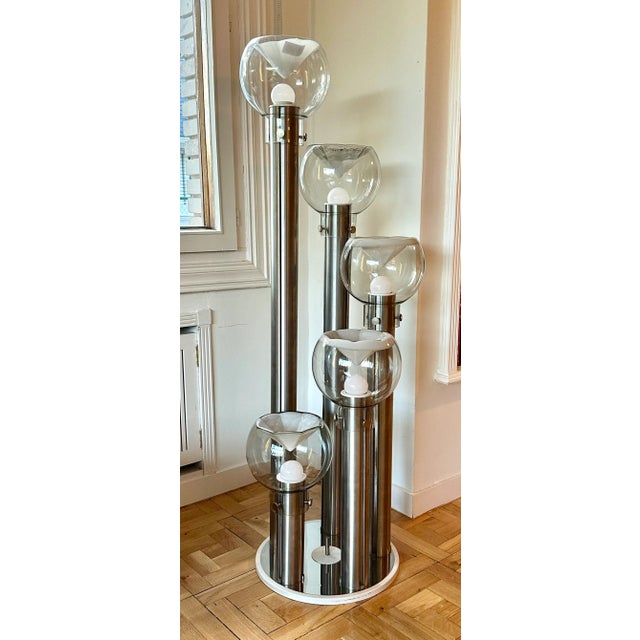 The light fixture can be placed on the floor as a floor lamp (as shown in the photo) or suspended from the ceiling....