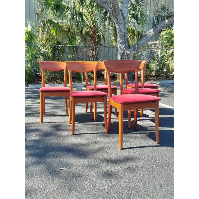 Set of Six Danish Mid Century Modern teak and upholstered dining chairs by Juul Kristensen. A unique set of dining chairs...