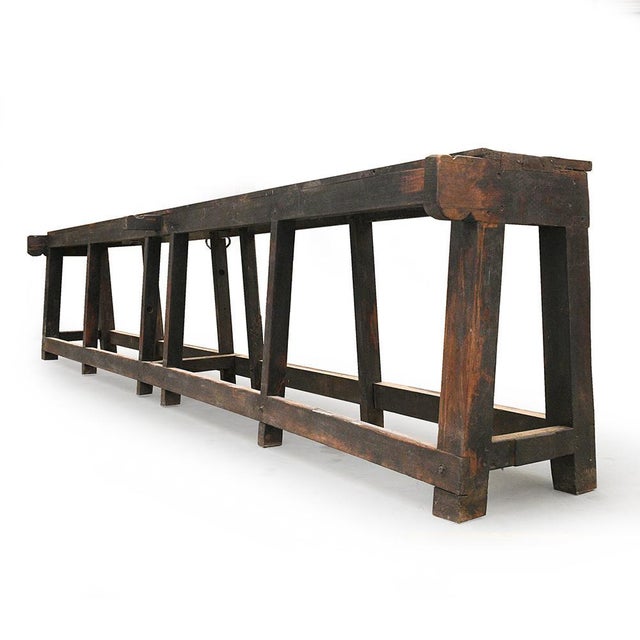 Long Wooden Table, in Very Good conditions. This piece is designed in the style of the selected designer and/or manufacturer