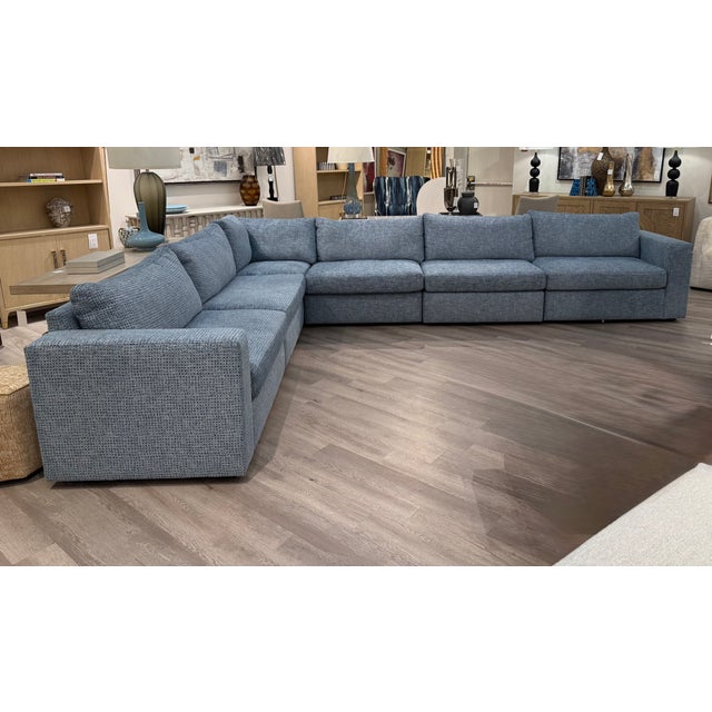 Spacious L Shaped Revelation Great Plains 6 Piece Sectional. Upholstered in a textured Blue dotted fabric. Featuring deep...