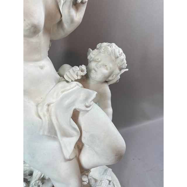 This remarkable 19th-century French biscuit porcelain sculpture depicts an elegant mythological composition of Venus...