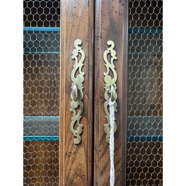 An elegant vintage Henredon secretary showcasing the exceptional craftsmanship and timeless detailing for which the...