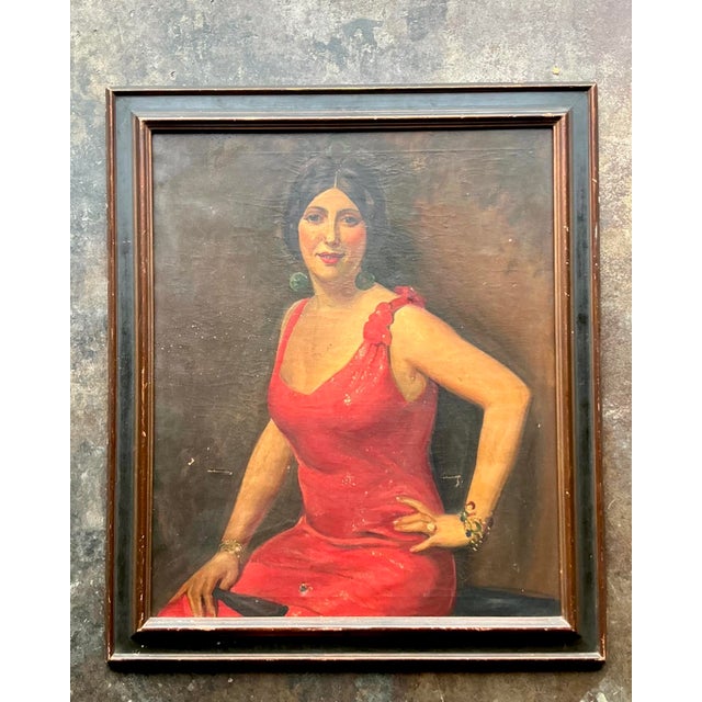 Command attention in any room with this dramatic vintage oil portrait, a stunning homage to Art Deco glamour and the...