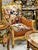 Experience the elegance of 18th-century French design with this exquisite Louis XV Bergère chair. Featuring a lavish hand-...