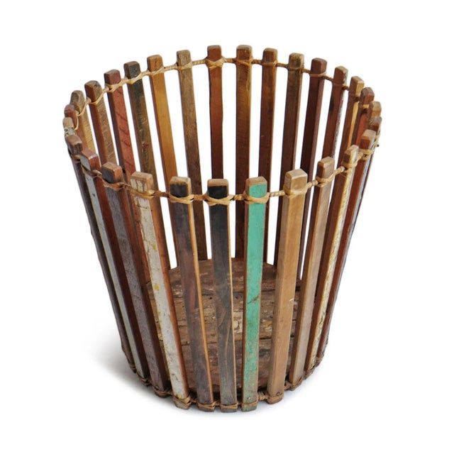 Salvaged boat wood crafted into beautiful and unique baskets. Aged original colorful paint adds fun and interest. Each is...