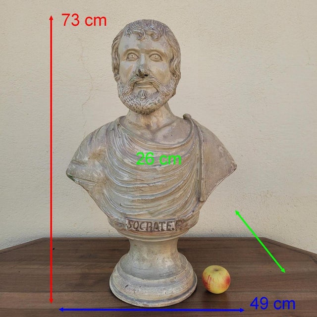 Important bust representing the famous greek philosopher socrates, made of glazed terracotta. the sculpture rests on a...