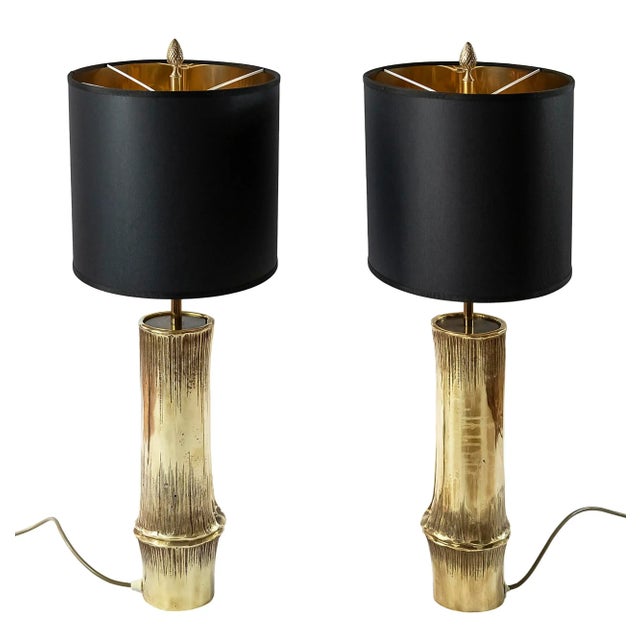 Pair of vintage French bamboo form bronze table lamps by Maison Charles. Lamp shades are oval form, new made. Singed on...