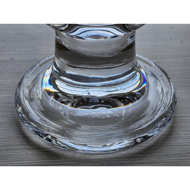 Simple design from a traditional concept. Large votive candle holders, a pair of bulbous shaped holders that fit standard...