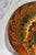 A striking example of turn-of-the-century folk art craftsmanship, this circa 1900 hand-painted pyrography wood wall plaque...