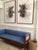 Hall bench with exposed frame detail. Front legs accented with antiqued brass mounts. In medium espresso mahogany. Sold as...