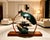 Artistic Statement: This work centers on an egg-like shell form, its upper surface gently fissured as if something is...
