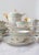 Tea or coffee set for 12 in French Limoges porcelain from around the 1950s, with a green band, gold rims and small gold...