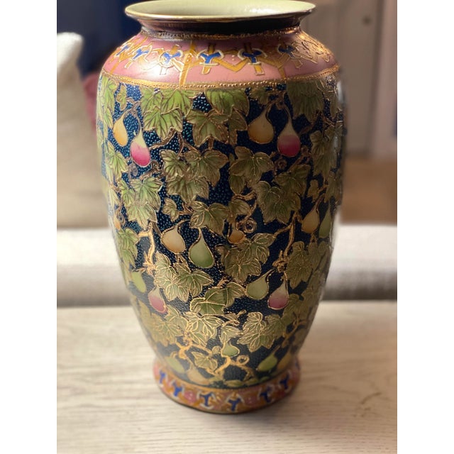 What’s not to love about this beautiful vase! Rose buds and green leaves wind their away around the piece, covering most...