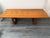 A magnificent dining table made entirely from solid cherrywood and oak . Geometric design inlays to the top with a pullout...