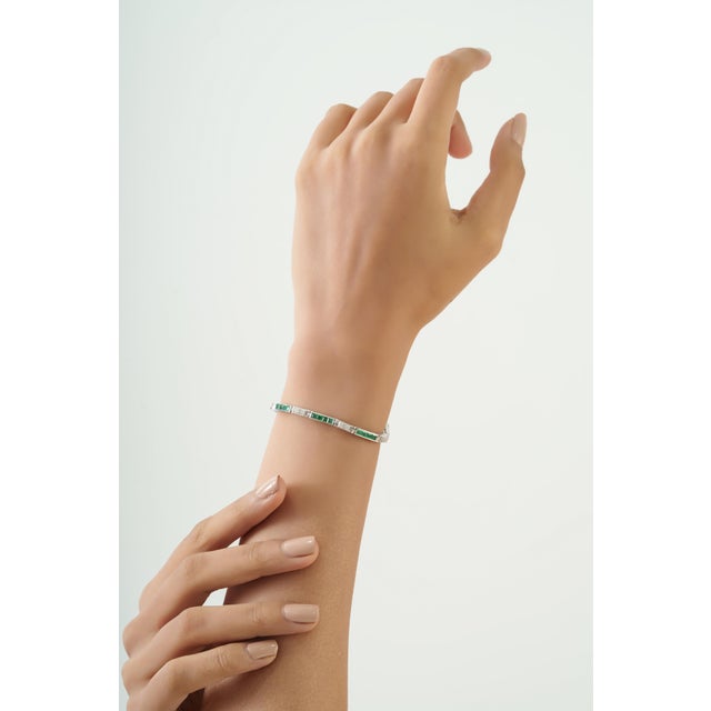The Carat&Her Emerald and Diamond Stackable Linear Bracelet brings together timeless gemstones with sleek, modern design....