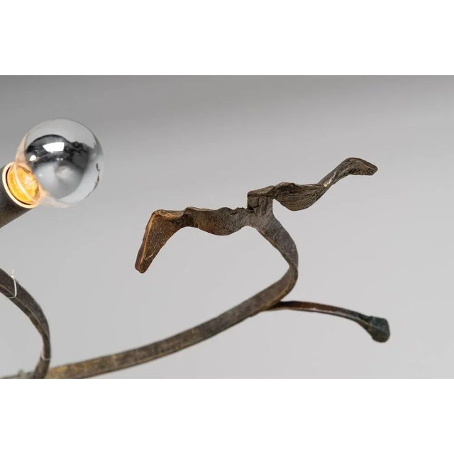 This sculptural chandelier, is a unique piece designed by Salvino Marsura and crafted in his Italian atelier in 1970, is a...